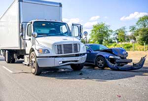 Commercial truck involved in a crash with a car