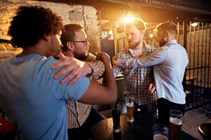 Fight about to breakout at a bar