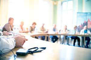 Group of directors and officers in a meeting