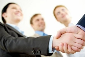 trade associations risks while shaking hands