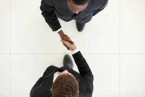 two people shaking hands after deal for Trade Associations Need Directors’ & Officers’ Insurance