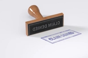 claim denied stamp on white background