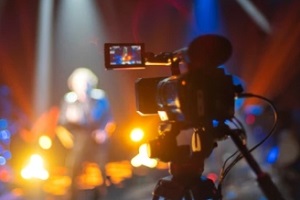 camera recording a music event