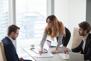 female client customer worker pointing at mistake in business document having complaint demanding change in terms