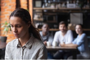 mixed race woman suffering from bullying