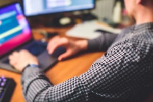 man working on laptop