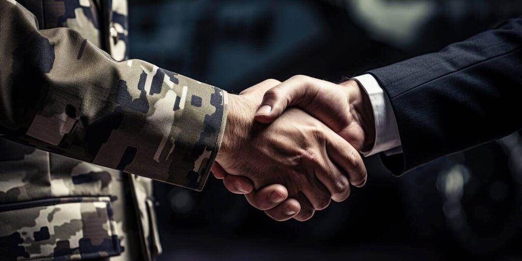 handshake of a military man and a businessman, close-up