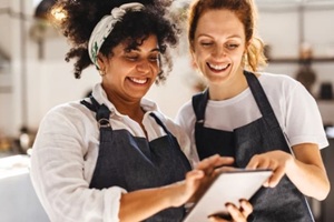 two waitress in hotel room