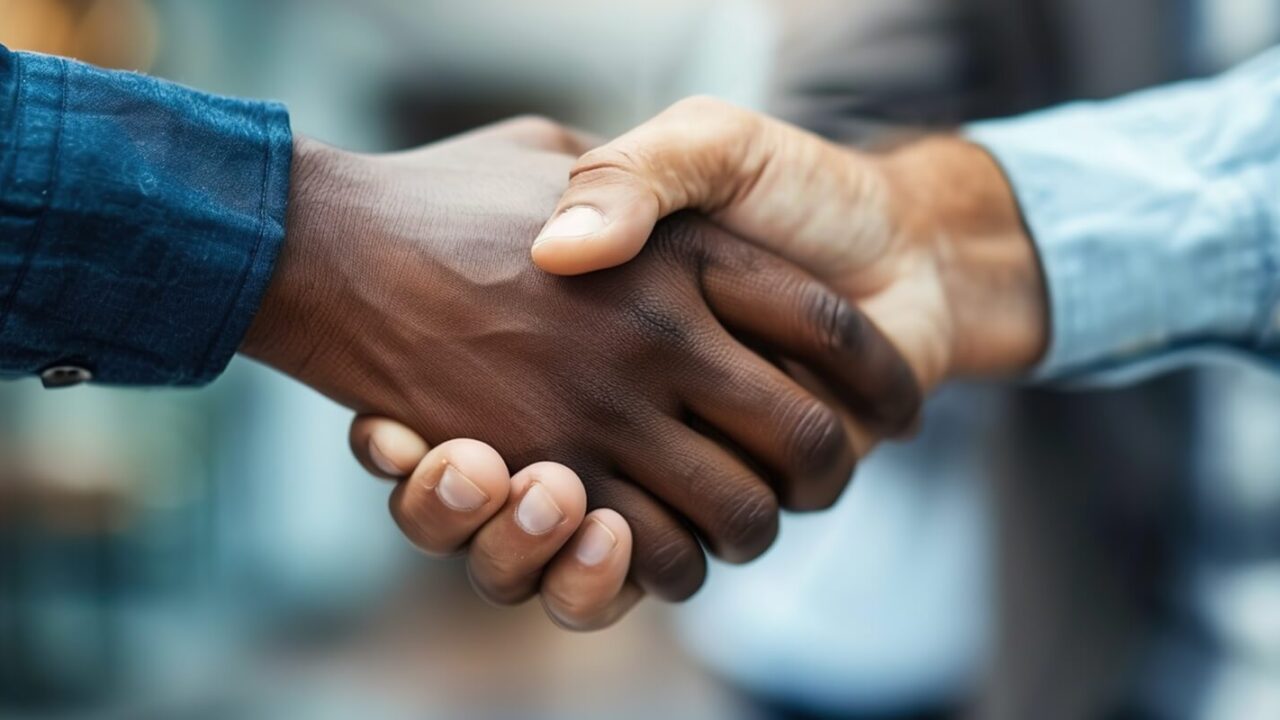 multicultural collaboration and agreement signing