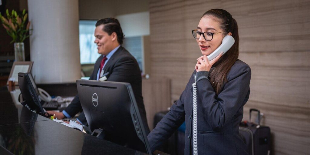 receptionists on a phone call