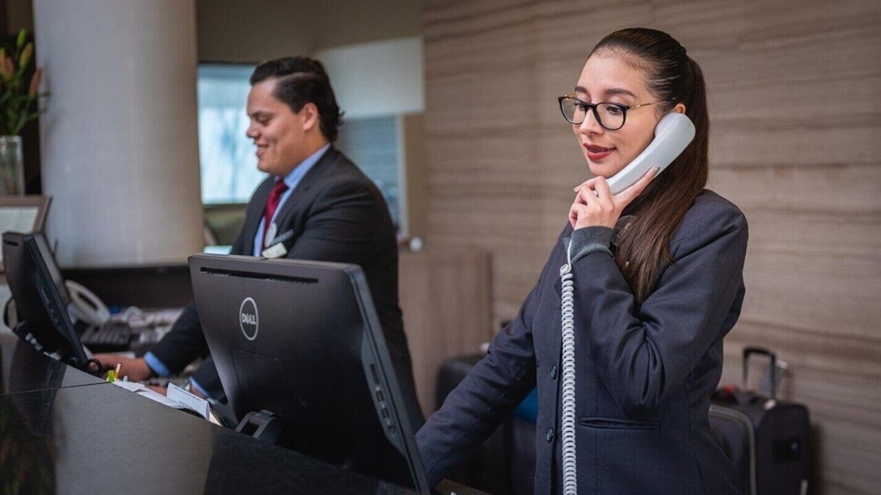 receptionists on a phone call