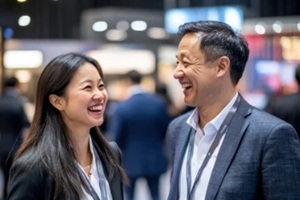 two asian people in trade association