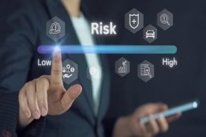Woman Touching Low Level on Risk Assessment Concept Screen
