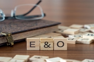 E&O Wooden Letter Tiles Representing Errors and Omissions Insurance