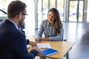 Insurance Agent Getting Signature on Papers from Contractor