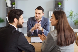 Agent Explaining Business Owners Trade Association Insurance Options for Volunteers Cover